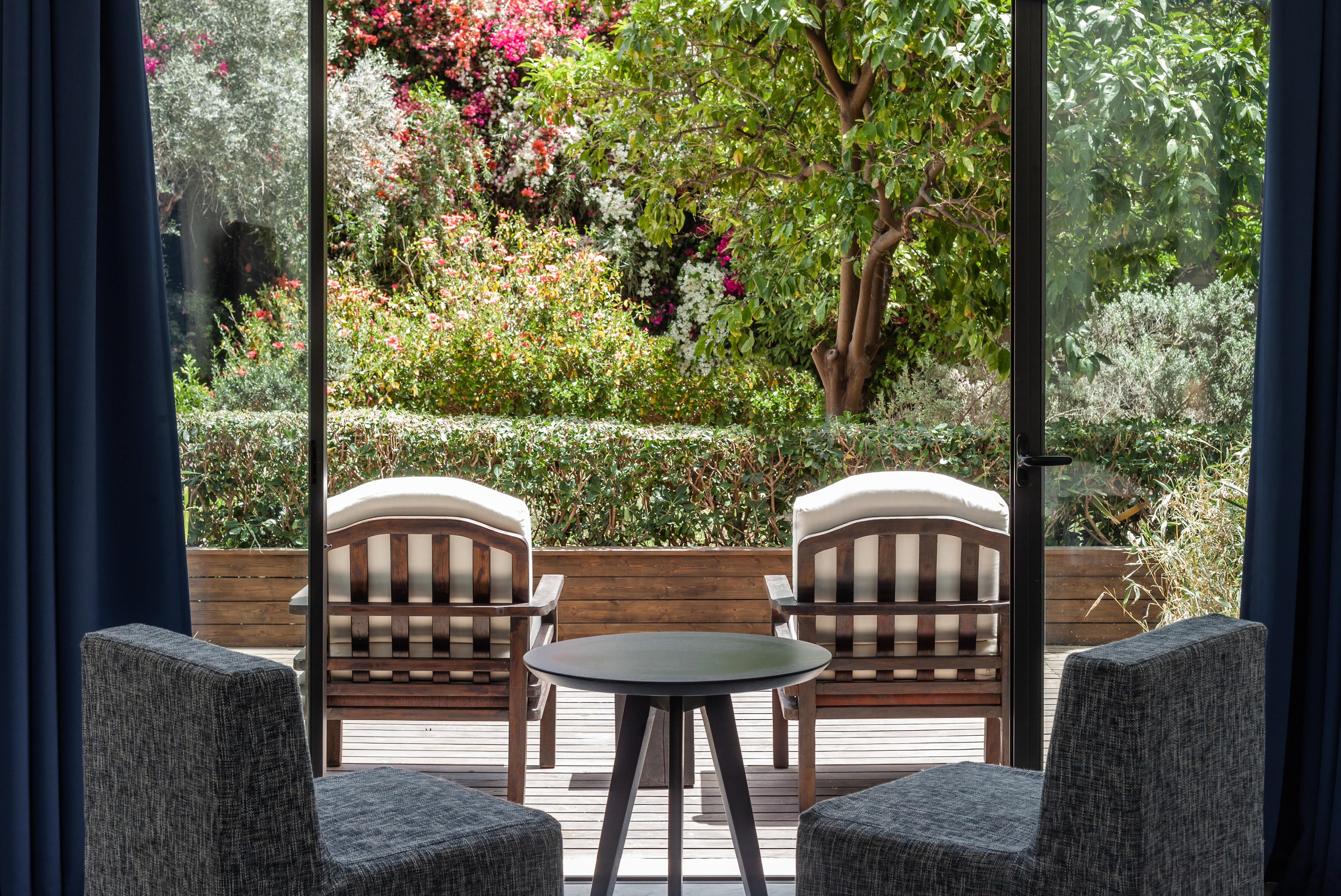 Almyra Hotel Paphos Bagian luar foto The garden