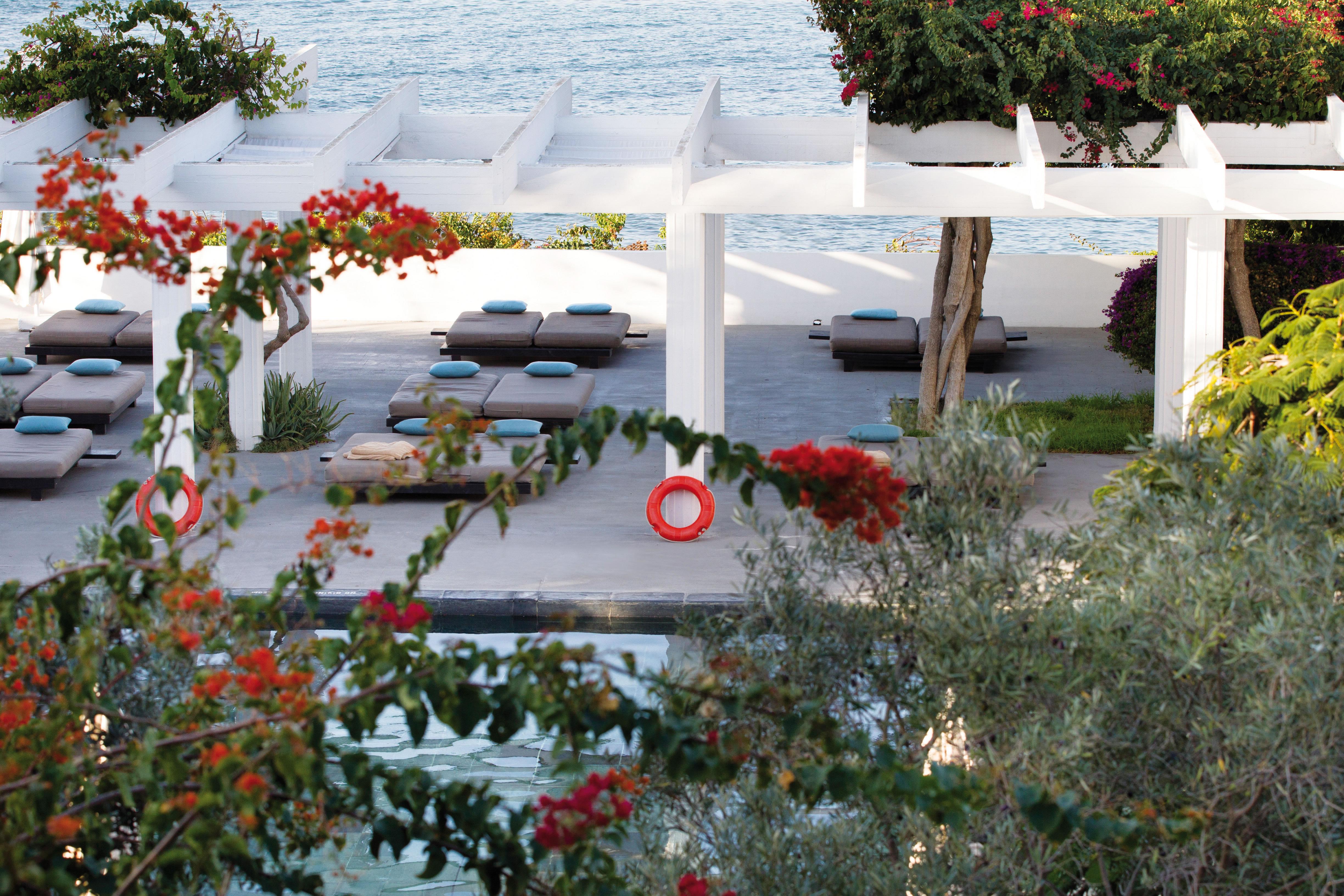 Almyra Hotel Paphos Bagian luar foto The pool at the hotel