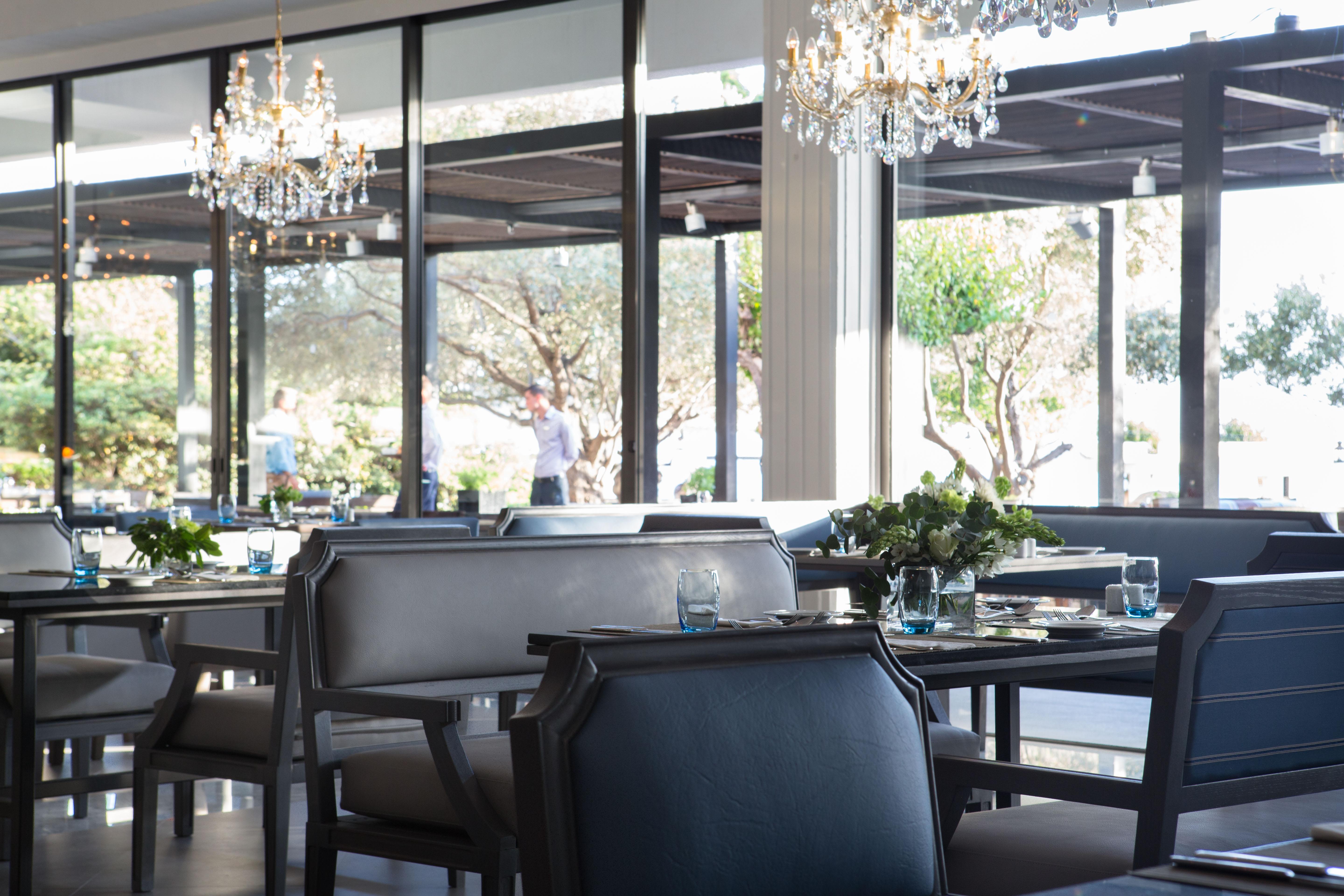 Almyra Hotel Paphos Bagian luar foto Interior of the restaurant