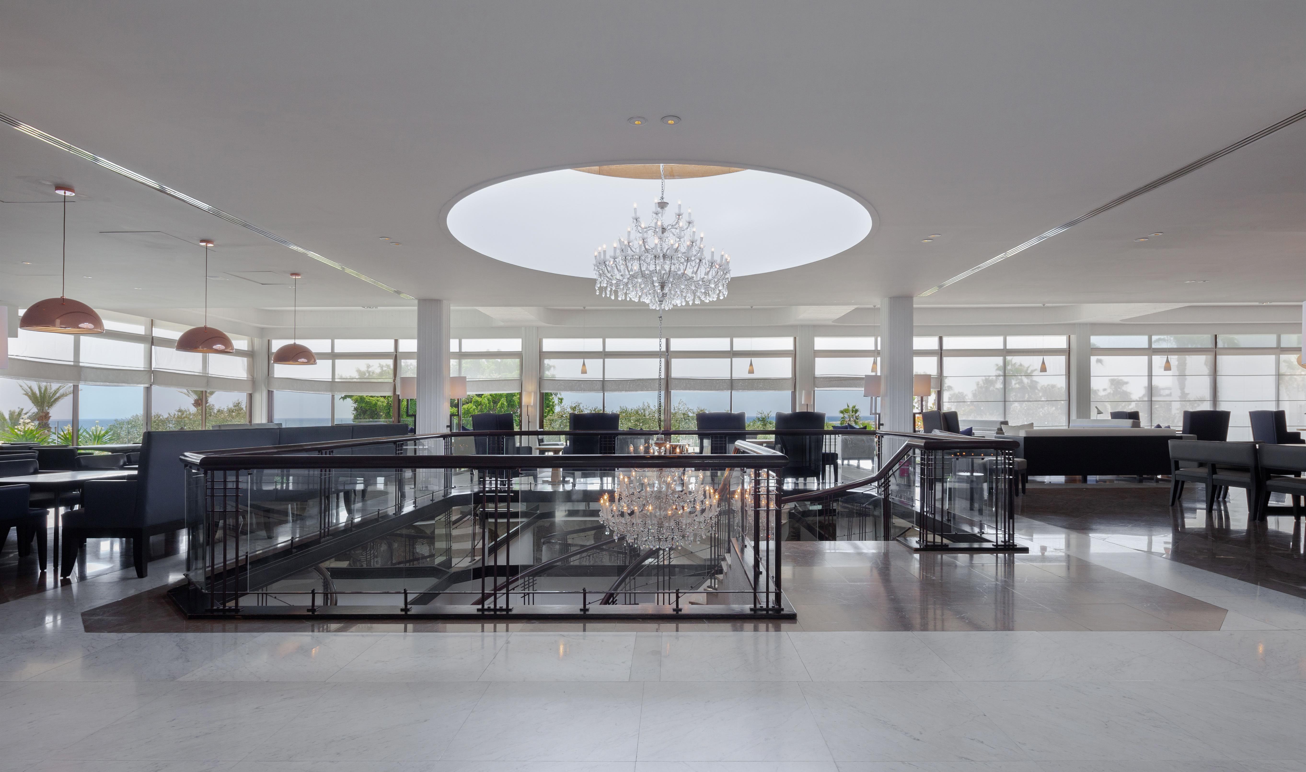 Almyra Hotel Paphos Bagian luar foto Interior of the building