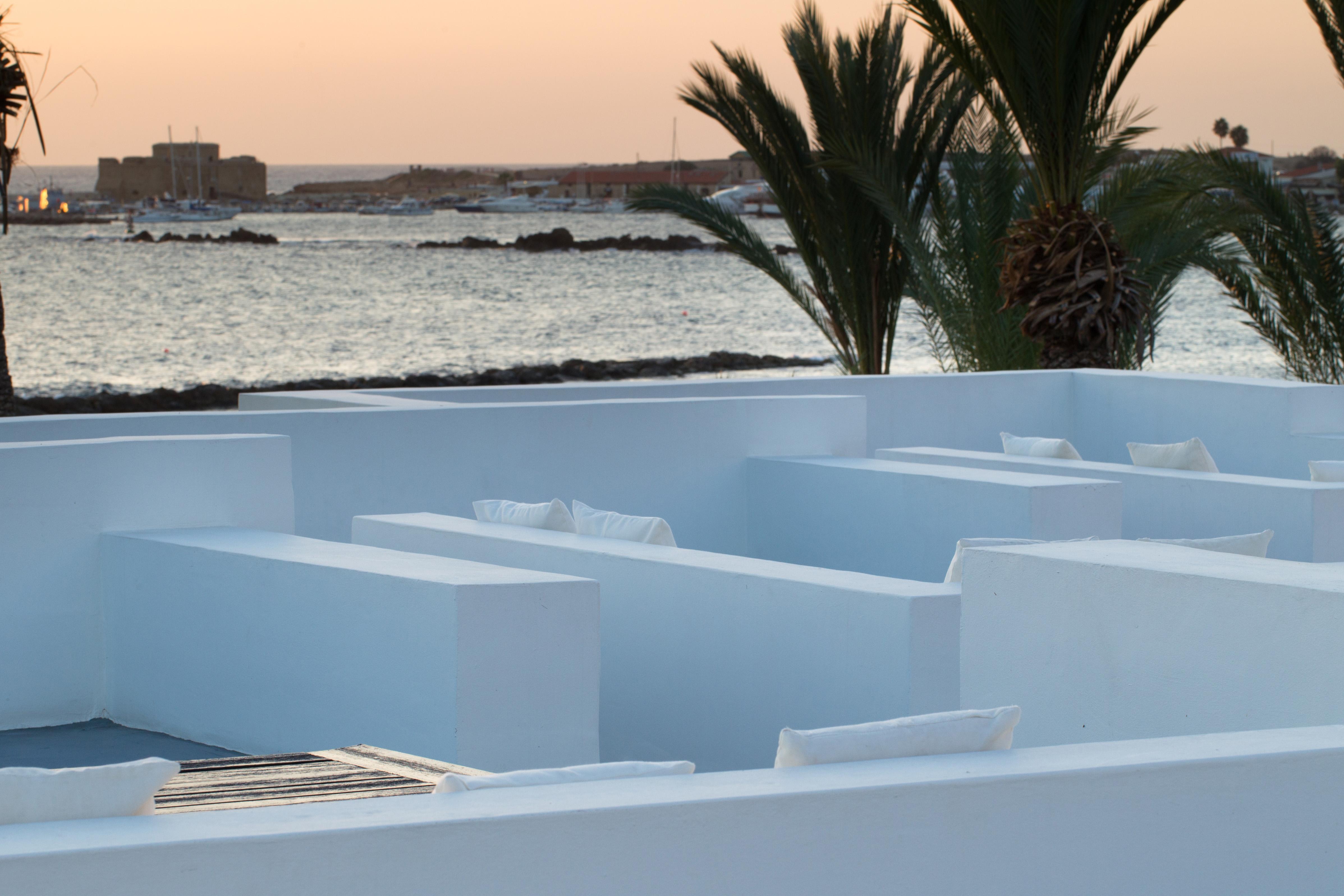 Almyra Hotel Paphos Bagian luar foto The whitewashed houses of the island