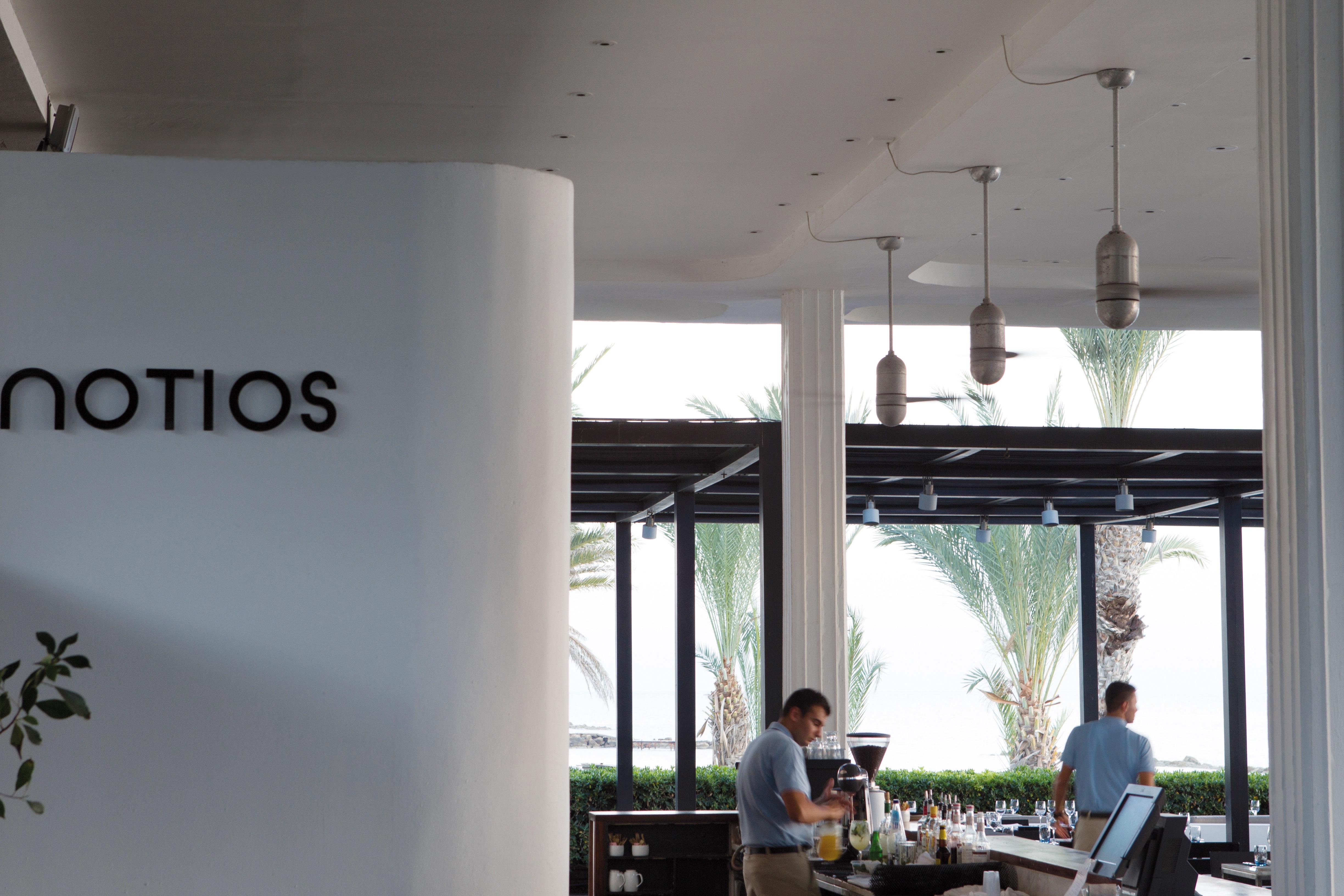 Almyra Hotel Paphos Bagian luar foto The interior of the restaurant