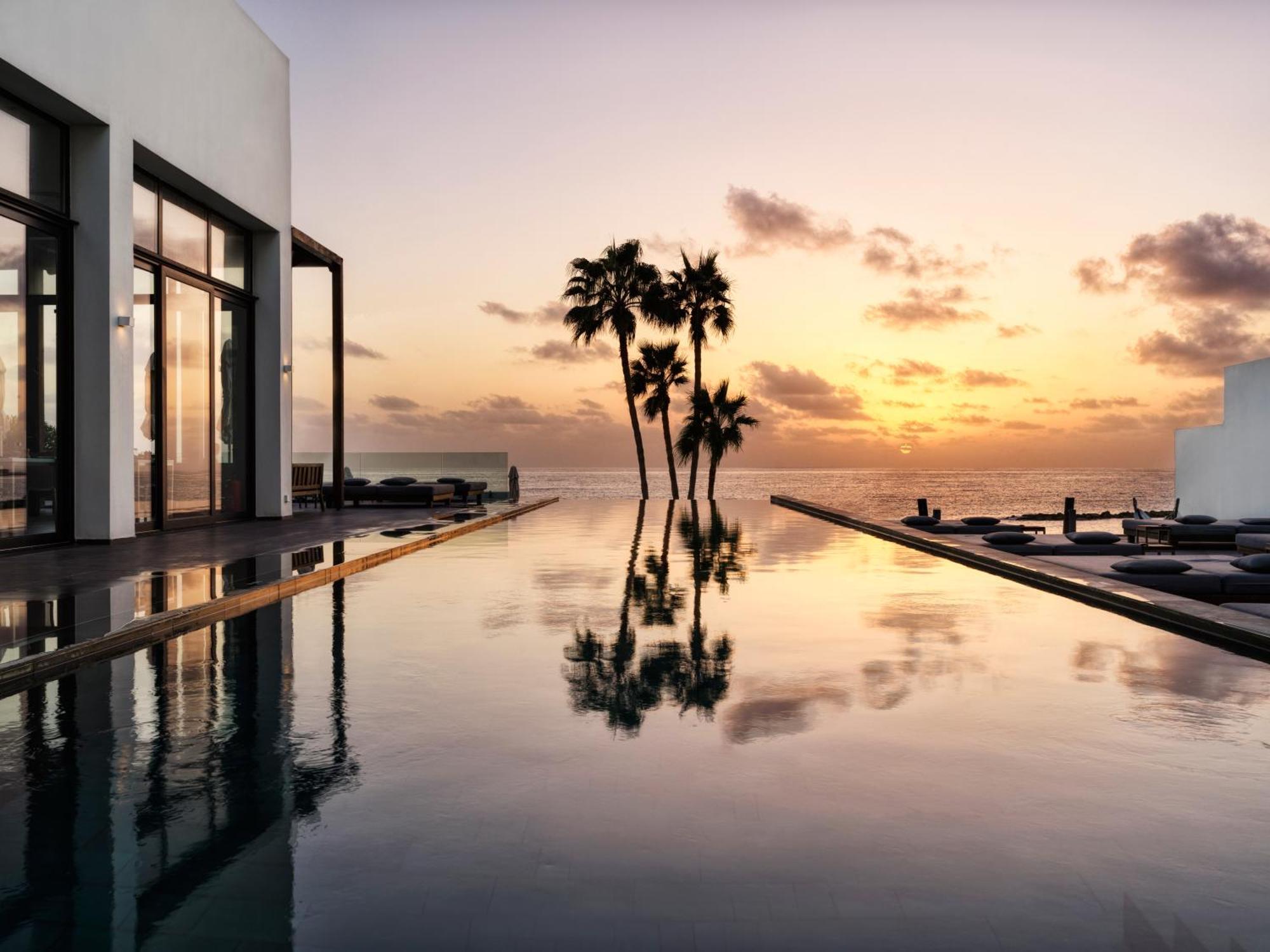 Almyra Hotel Paphos Bagian luar foto Sunset at the St Regis Maldives