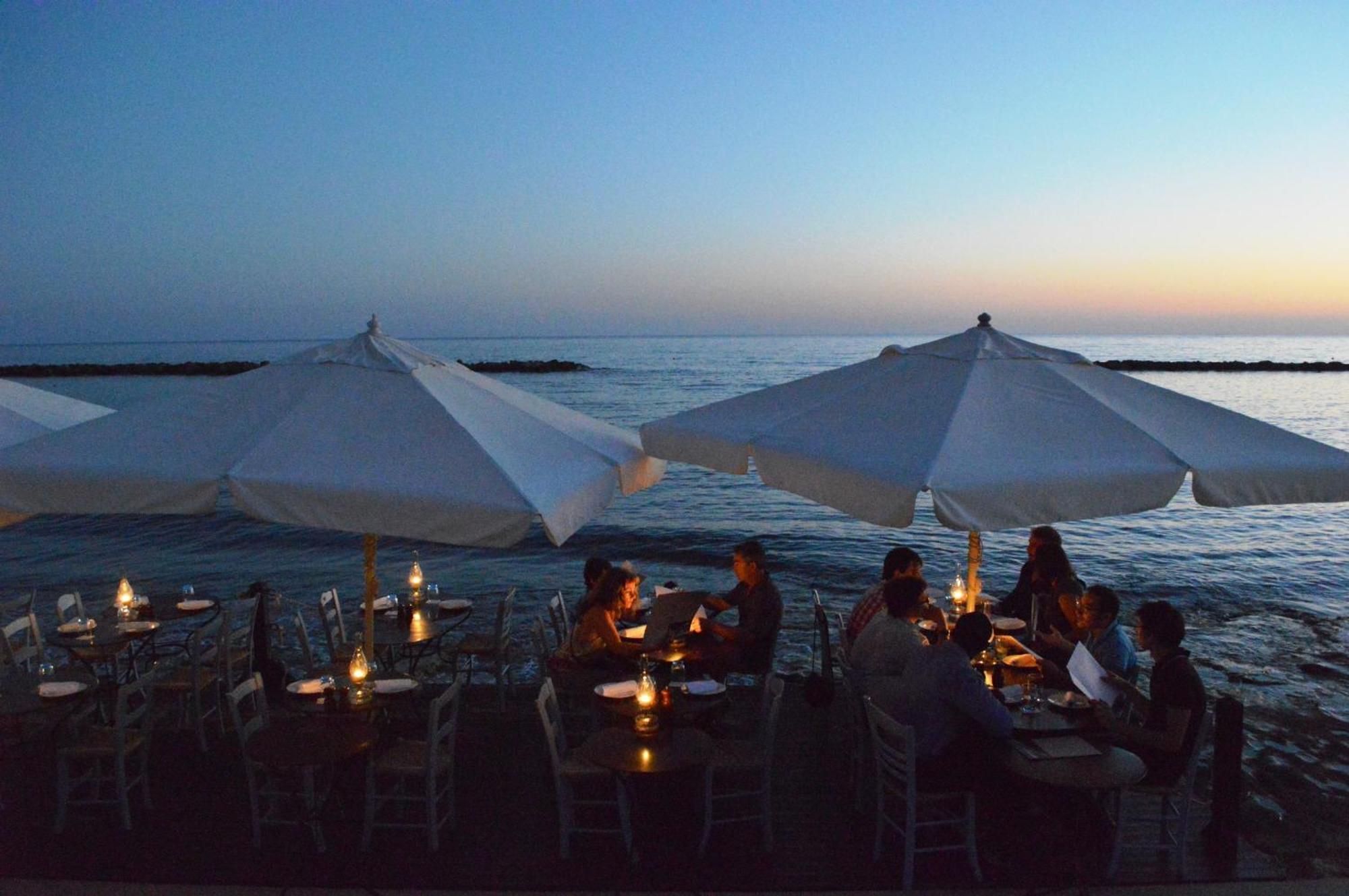 Almyra Hotel Paphos Bagian luar foto Beach restaurant in Italy