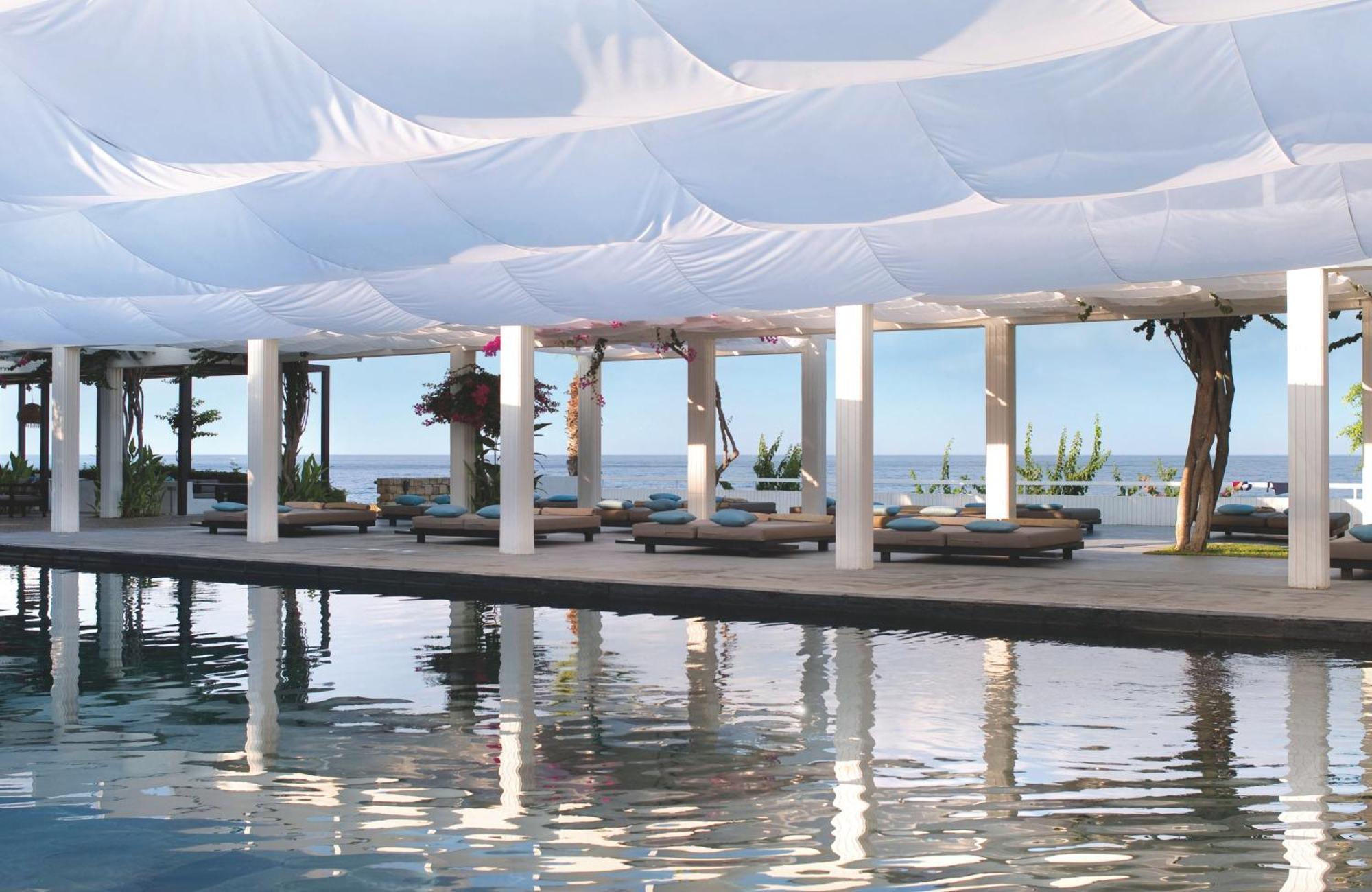 Almyra Hotel Paphos Bagian luar foto The beach club at the resort