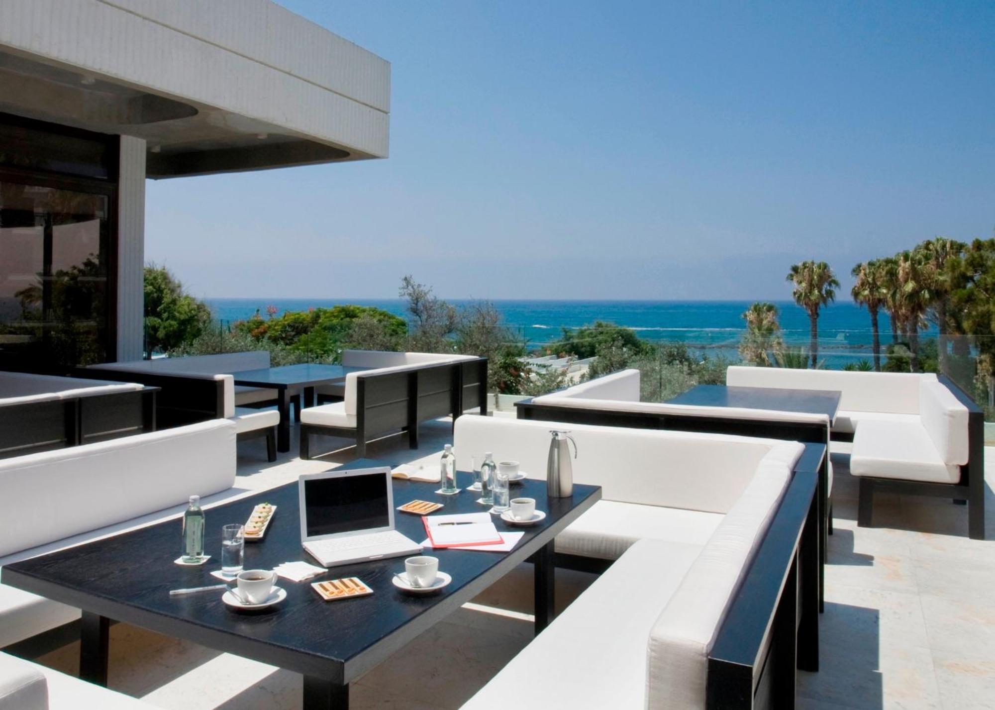 Almyra Hotel Paphos Bagian luar foto The Sky Bar
