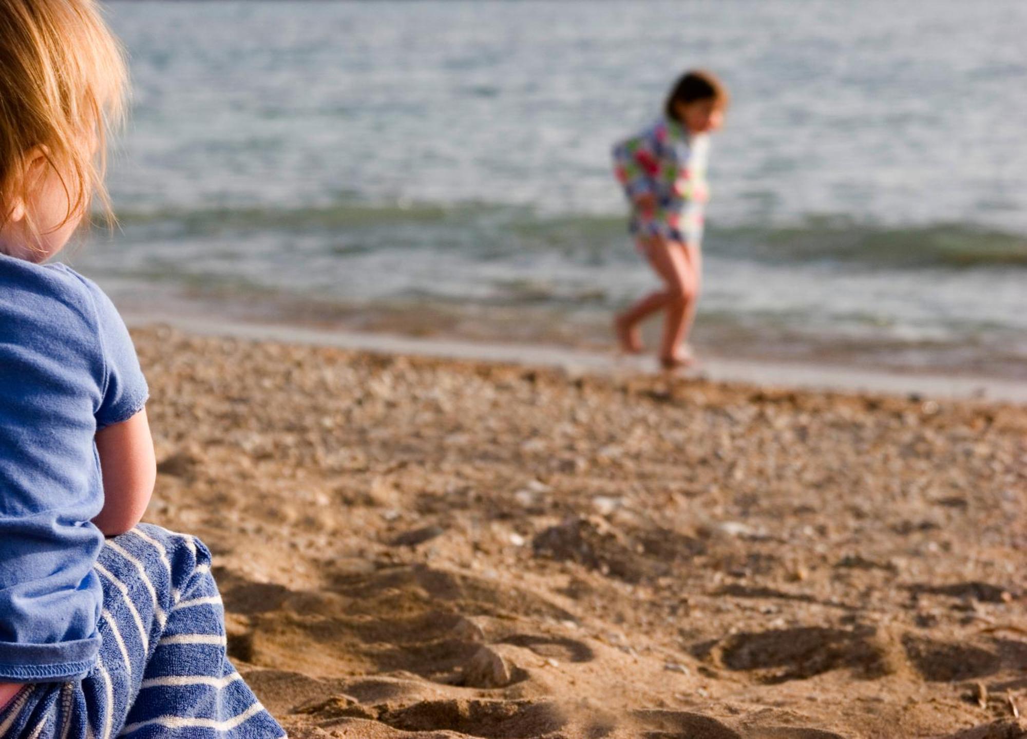 Almyra Hotel Paphos Bagian luar foto Children on a beach