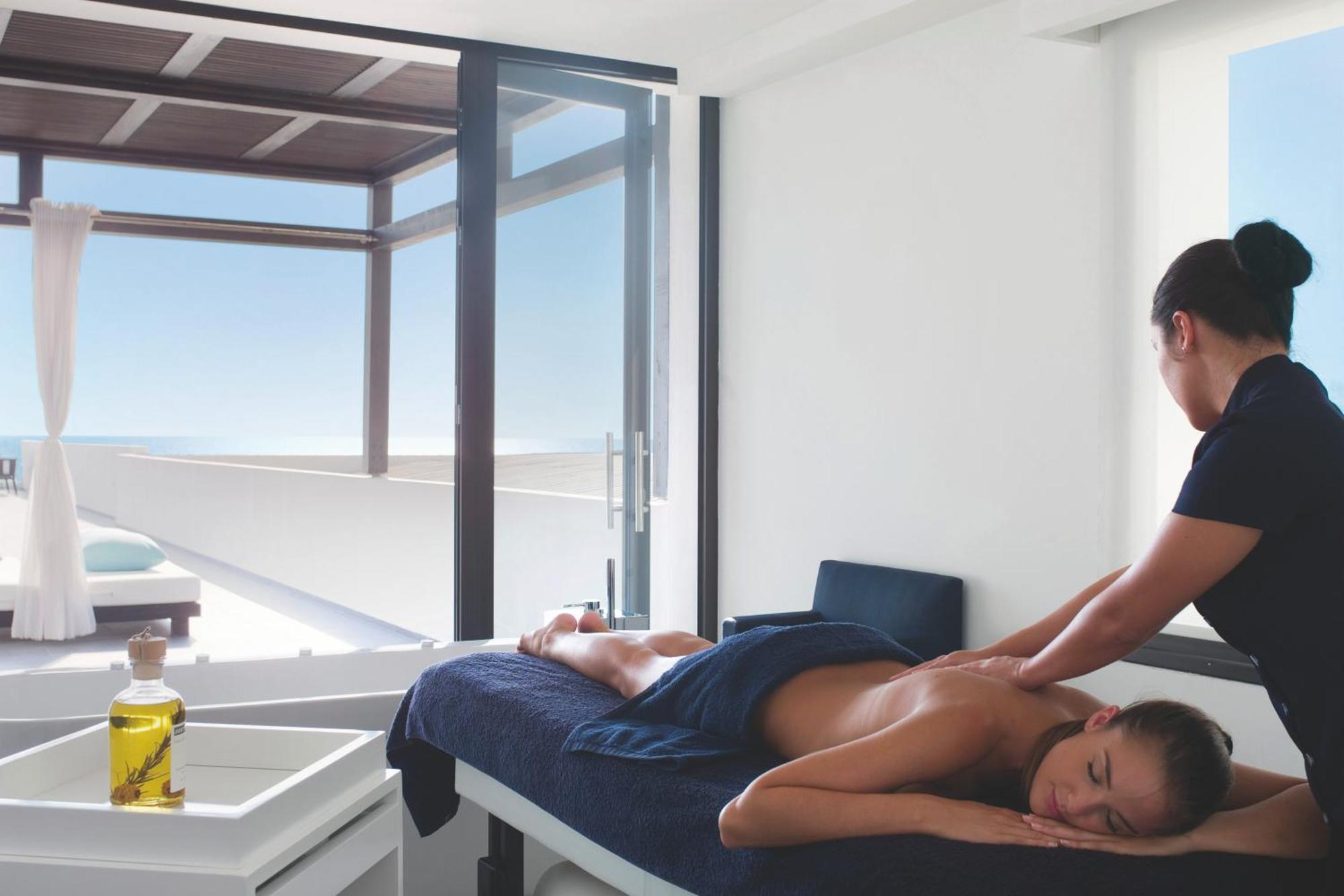 Almyra Hotel Paphos Bagian luar foto Massage